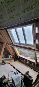 Aménagement d'un grenier à Beersel - Ouverture pour velux 3en1