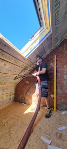 Aménagement d'un grenier à Mons - Insufflation de la cellulose IQ3 dans les caissons en toiture