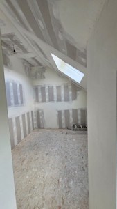 Aménagement d'un grenier à Waterloo - Réalisation des enduits sur les plaques de plâtre (vue 5)